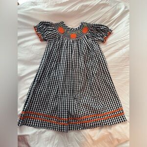 Black and White Gingham Dress with Orange Accents